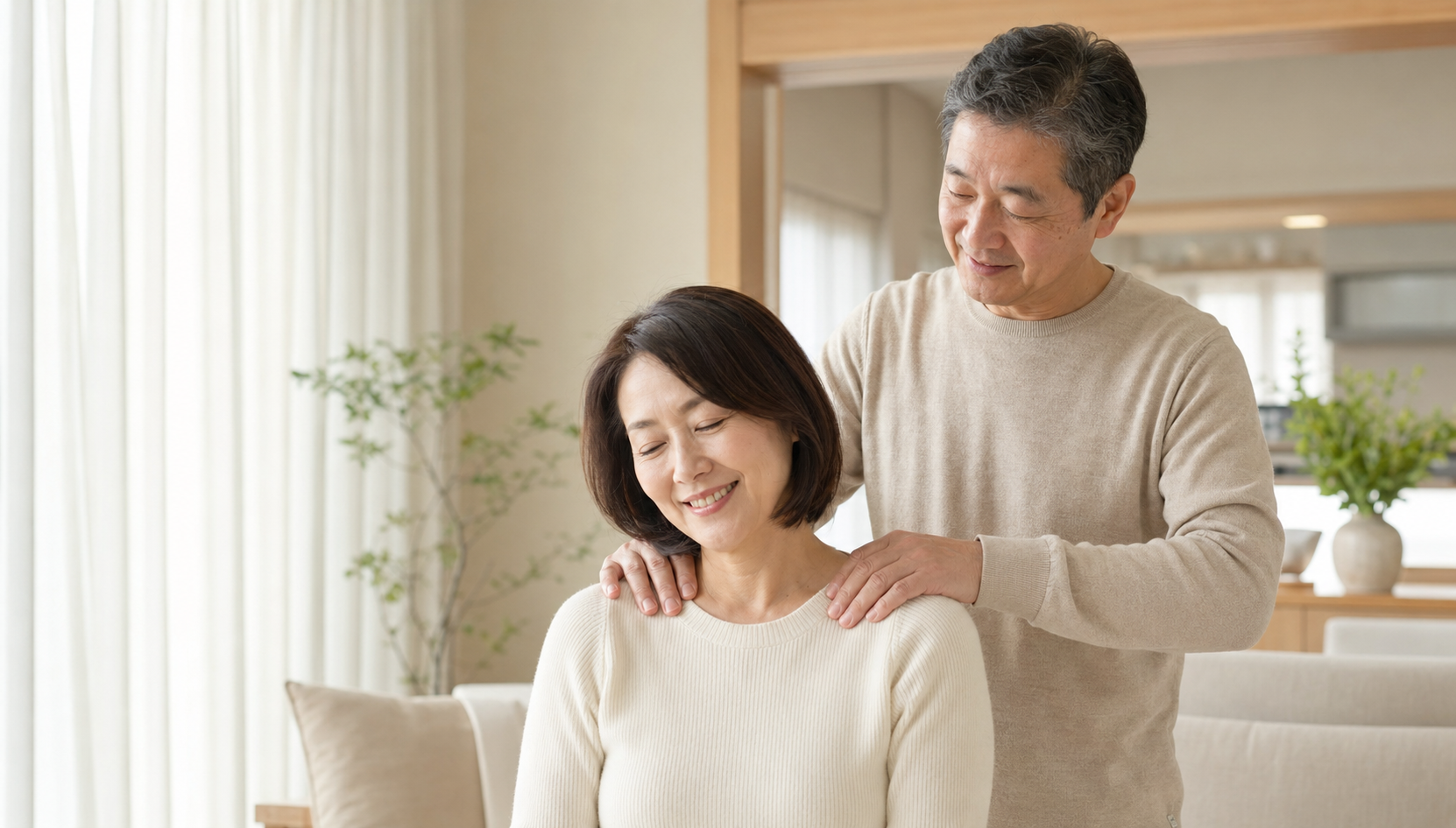 夫婦で肩こりケアを行うイメージ